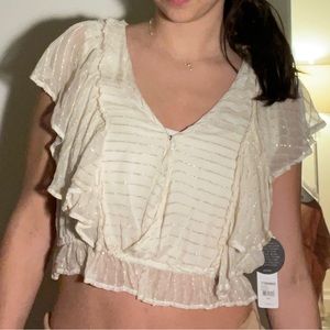 Cream colored cover up top from Revolve